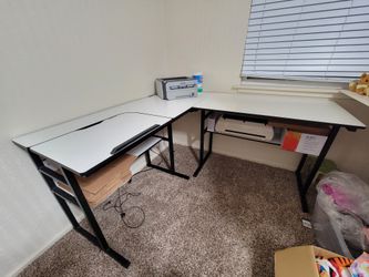 White L shaped corner desk with laptop holder and shelf