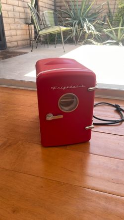 Red Frigidaire mini fridge