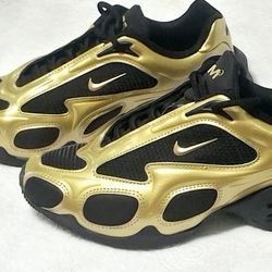 Nike Air Max Muse in the Metallic Gold/Black colorway. 