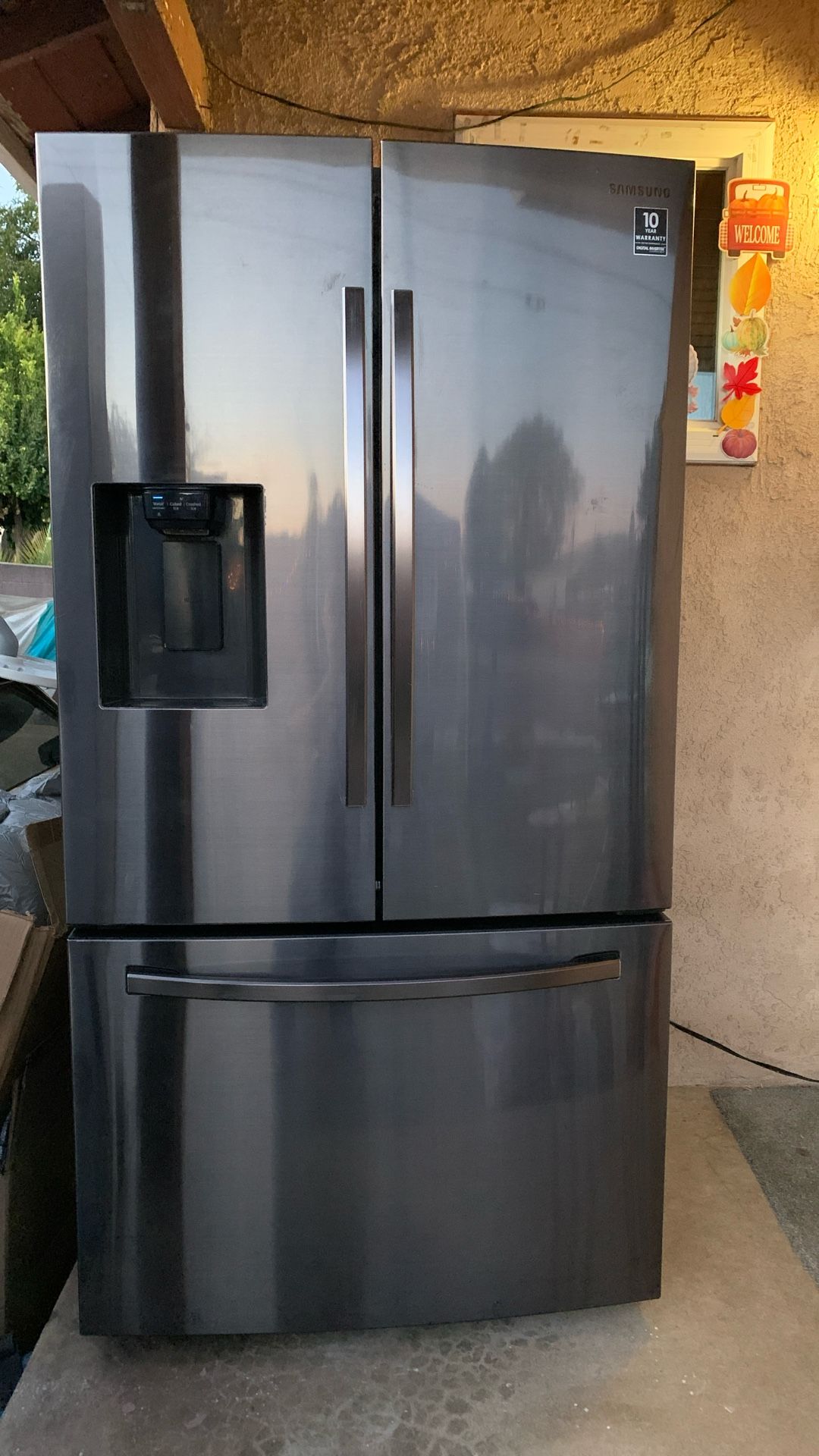 SAMSUNG REFRIGERATOR 27 CUBIC FEET BLACK STAINLESS STEEL ICE MAKER DOES NOT WORK ANYMORE!