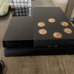 PS4 with a Controller and A10 Headset