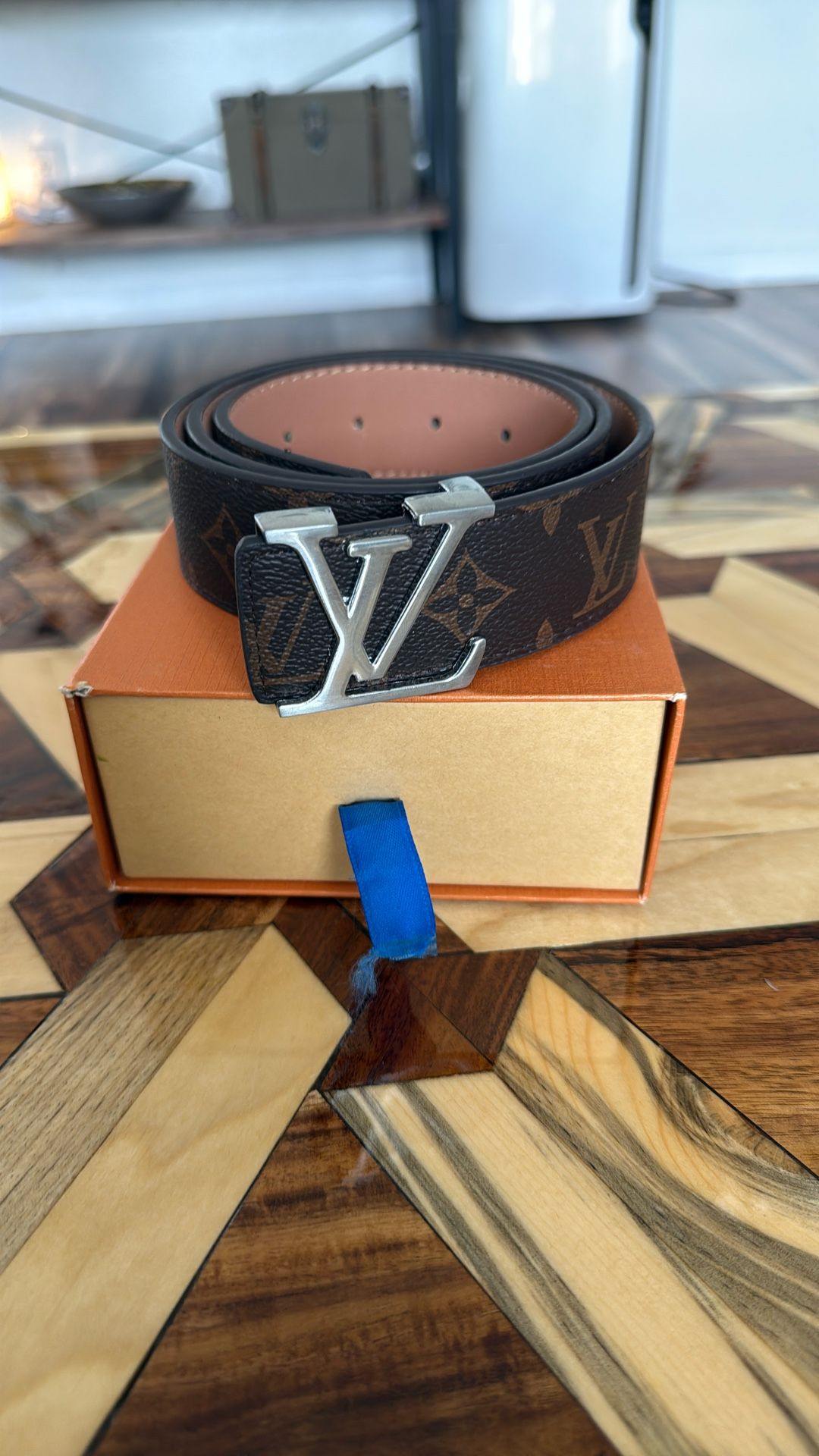 Brown Louis Vuitton Belt with Silver Buckle