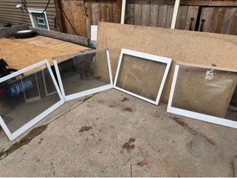 4 Windows, 35 by 28, wooden frame with vinyl outside white covering, $5 each