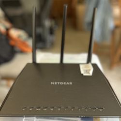 NETGEAR R6900 — Nighthawk AC1900 Smart WiFi Dual Band Gigabit Router