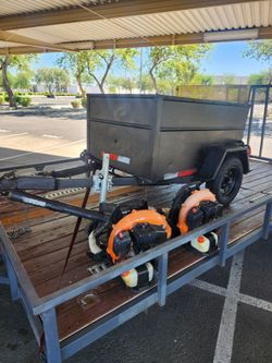 Utility trailer (blowers included)