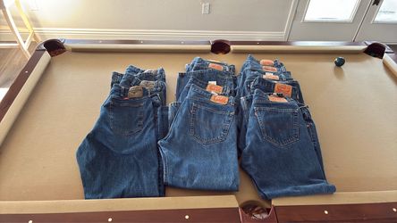 12 pair of Levi’s and Wrangler Men’s Jeans 36” waist