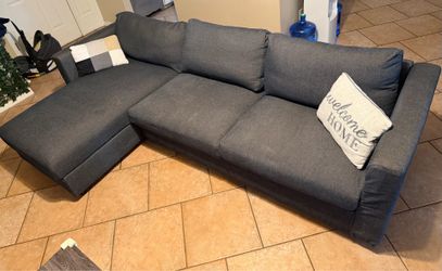 Sectional with storage and queen pull out bed