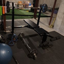 Adjustable Workout Bench With Leg Curl Attachment