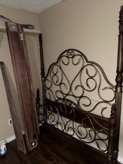 Selling king bed frame no box springs
