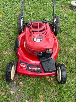 Lawn mower toro recycler start right up very good condition front wheel drive self propelled work great