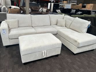 Cream sectional w/ storage ottoman