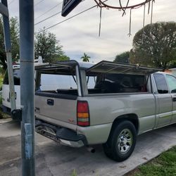 It is in very good condition, it comes with the key to open the three windows and it is for a GMC Sierra or a Silverado.