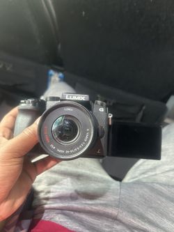 Panasonic Lumix G7 w/ 14-42mm + 45-150mm lenses