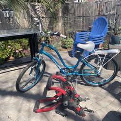 Townie woman’s bicycle plus car carrier.