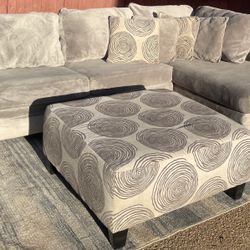 Rooms To Go Gray 2-Piece Sectional and Ottoman