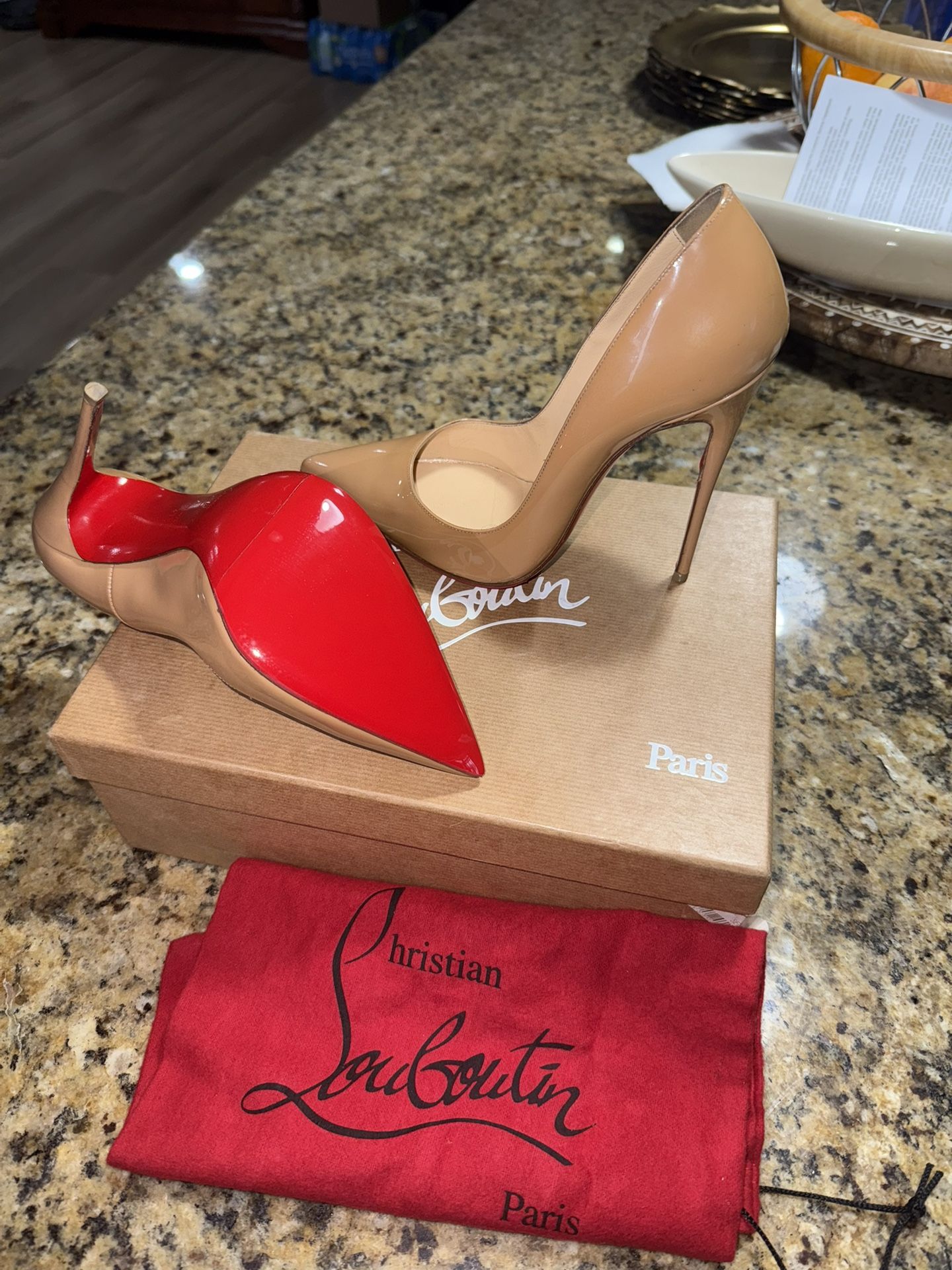Christian Louboutin Red Bottoms (Original)