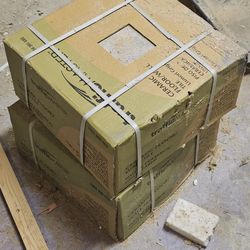 3 boxed of Grey tile and a few loose ones