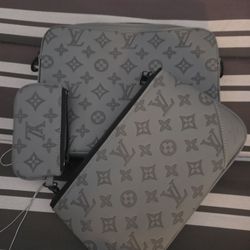 Louis Vuitton Pochette Voyage MM in gray Monogram Eclipse canvas