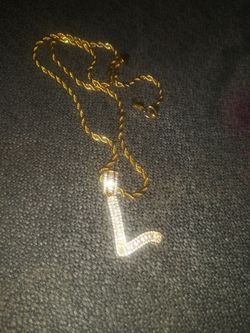 Iced out L pendant and 18 inch chain