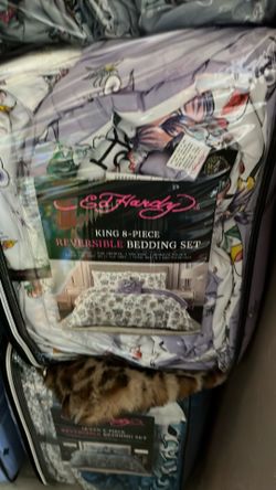A new king ed Hardy bedside, including sheets