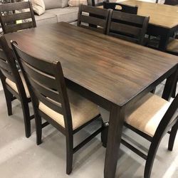 Rokane Brown Dining Table and Chairs (Set of 7) / 
