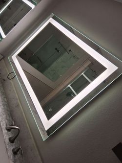 Mirror with light