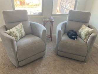 2 Silver Swivel Recliners