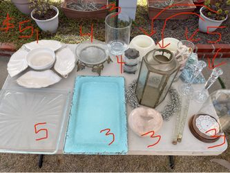 Beautiful serving trays, interesting antique looking glass pieces/bowls, lantern/candle holder, Crystal candlesticks