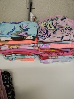 Girl Size 7/8 Shirts, PJ's, and Pants 2 Dollars Each Item About 40-50 Shirts