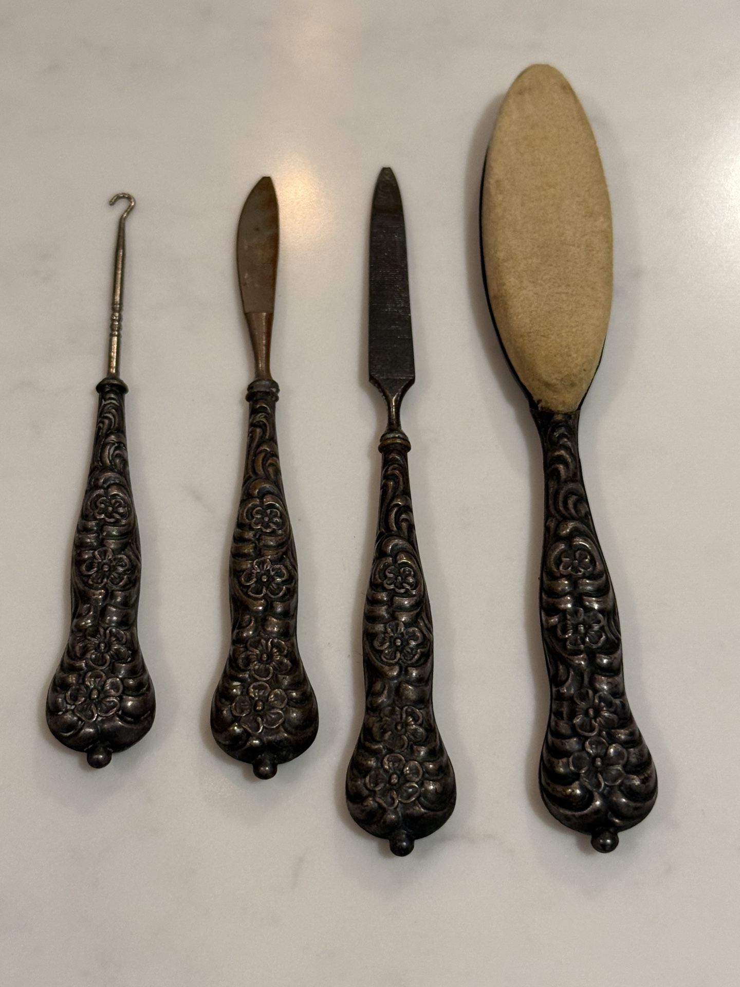 Antique sterling silver manicure tools