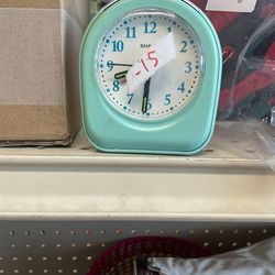 Small battery alarm clock