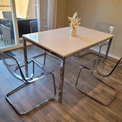 White Chrome Table and 4 Clear Chairs_Like New