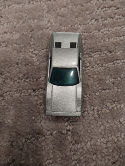 The item in the image is a vintage Hot Wheels "Racebait 308" diecast car.