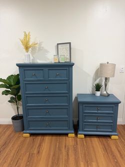 Beautiful star blue  dresser and nightstand  with  brass knobs . Drawers all work.
