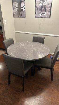 Dining room table with four chairs