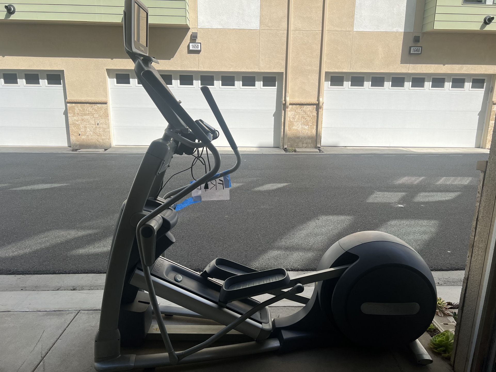 Precor elliptical machine, likely a model from the EFX series