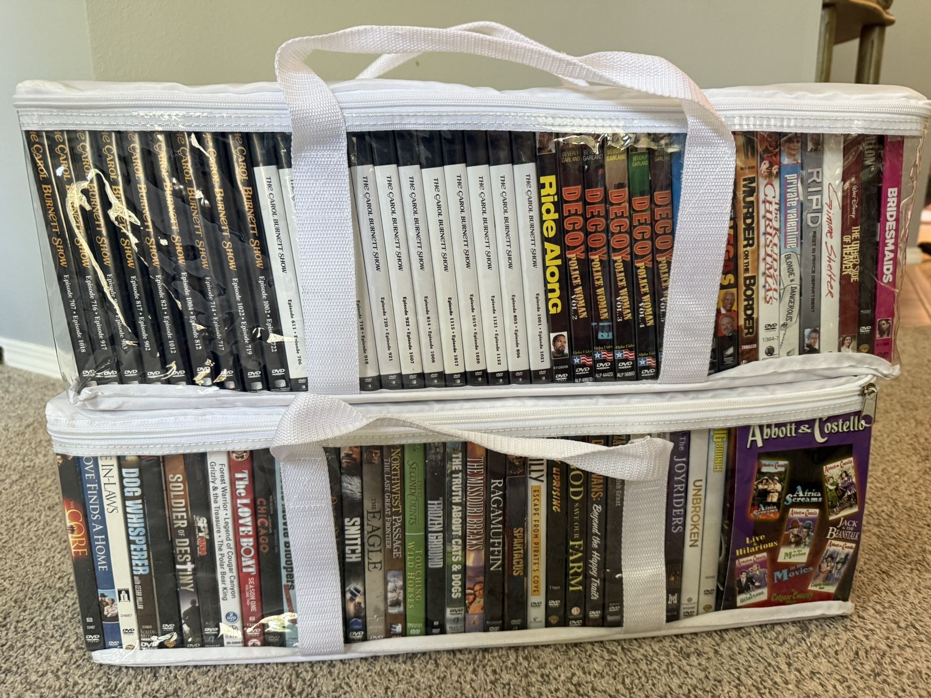 Two Zip Cases Of DVD Movies - Zip Cases Included