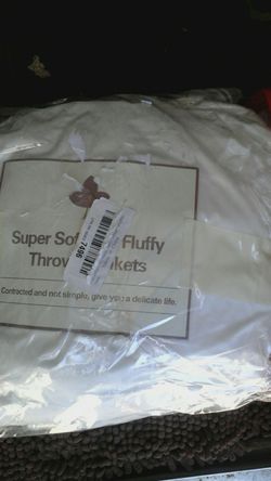 Super Soft and Fluffy Blanket Twin size White in color