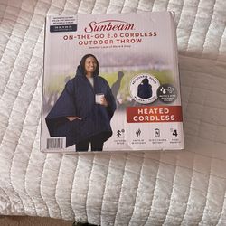 On the go cordless heated throw