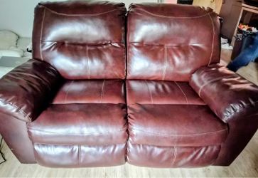 Brown Pleather Love Seat.