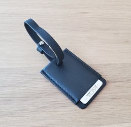 AUTHENTIC TUMI Bag Charm Tag with Silver-Tone Metal Faceplate in Black Leather Case