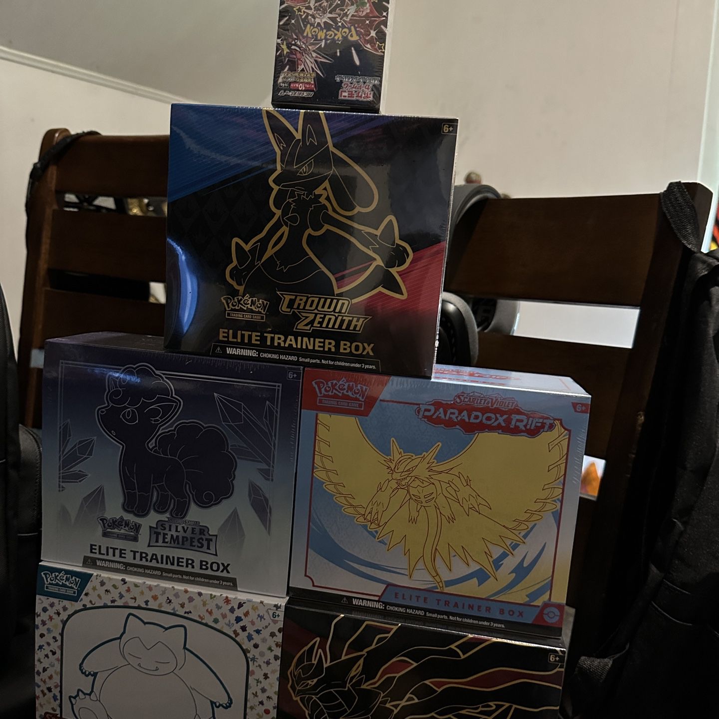 5 Pokemon ETBs and 1 Japanese Booster Box. 