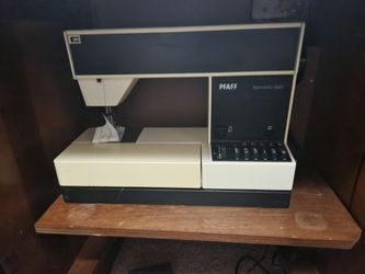 Sewing machine and cabinet
