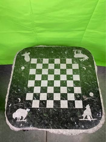 Custom Signed Unusual Stone Chess Board with Glass Playing Pieces on a White Metal Table