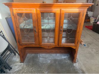 Need gone…. glass and wood cabinet