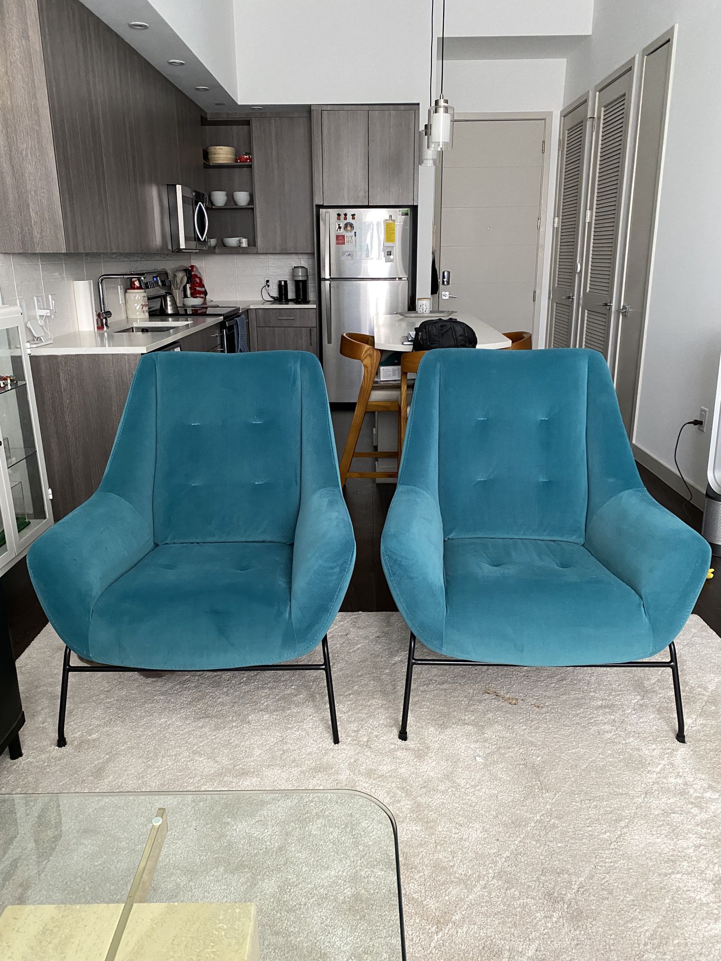 Two Teal Accent Chairs