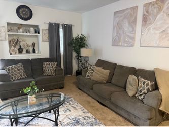 Entire living Room Set Includes 2 couches 3 tables 2 lamps and Rug