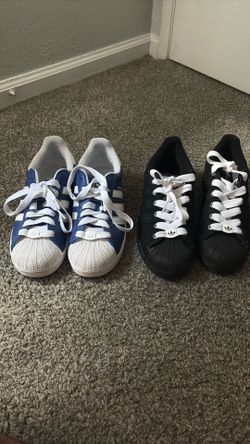 2 pair of adidas shoes