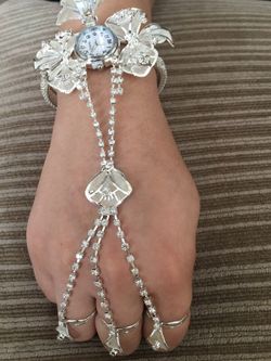 Bangle with watch with chain and rings