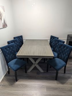 Grey table with 6 chairs. High quality.
